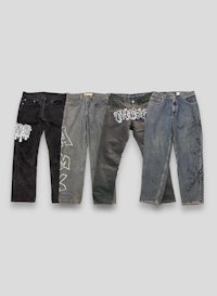 four pairs of jeans with different designs on them